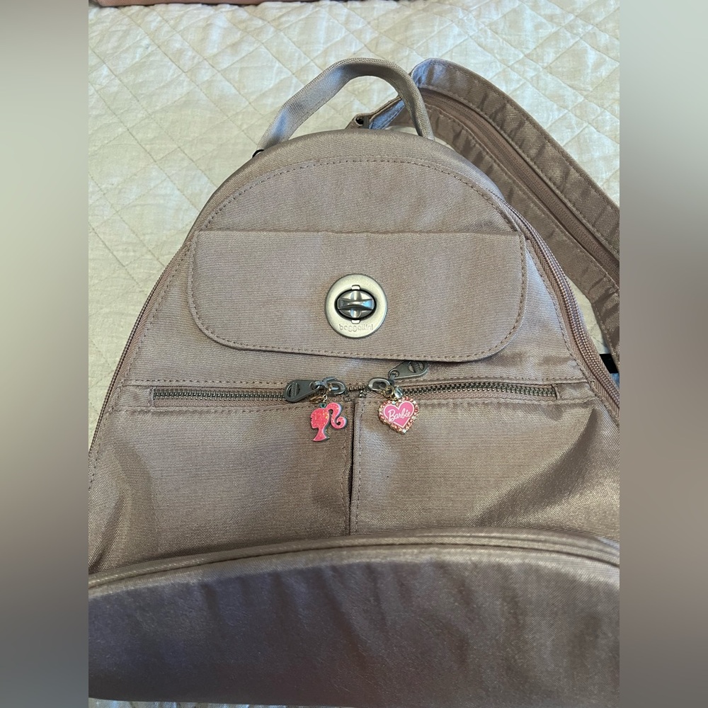 Blush Backpack with Pink Barbie Charms
Small size and easily carried